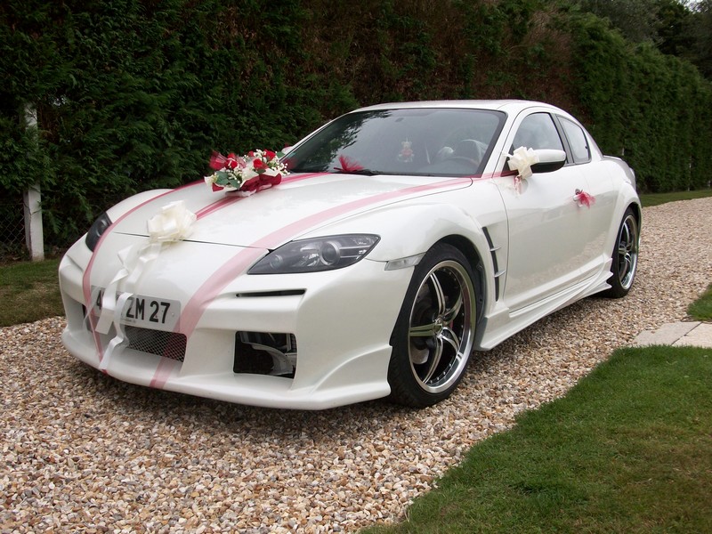 en voiture de marié pour le marriage de ma mère pas mal non ???
